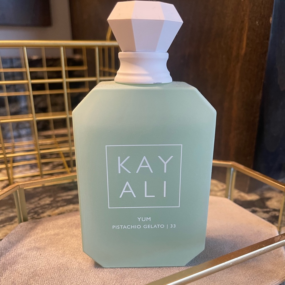 Kayali Yum Pistachio Gelato perfume. Used but has around 80-90% left of 3.4 oz
